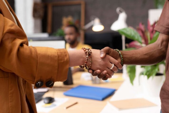 Two people shaking hands