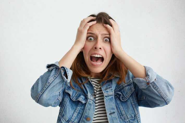 Woman screaming in despair after learning to write in Arabic, one of the scariest languages according to our followers.