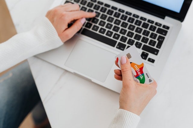 Picture of a woman spending money online